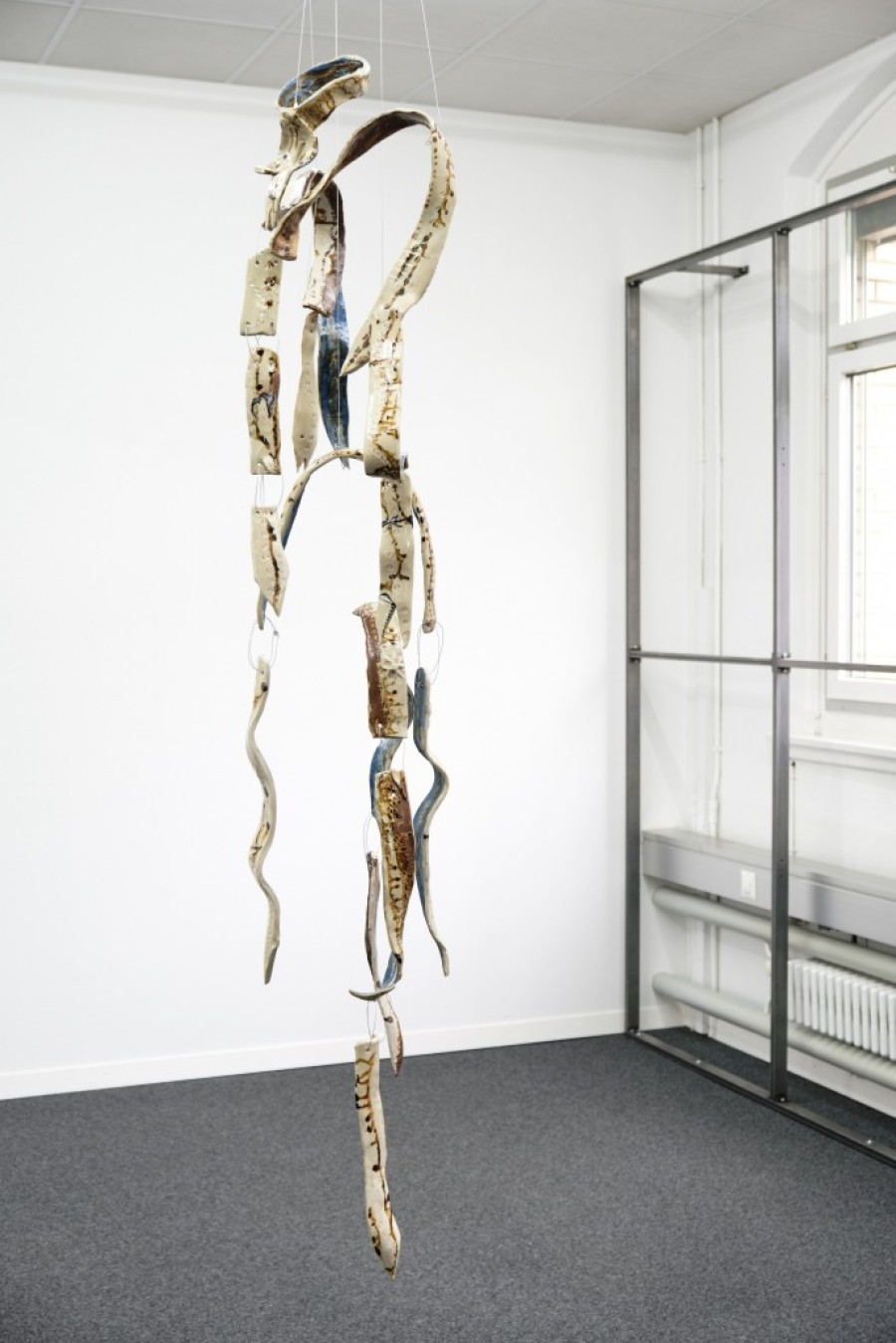 Camille Dumond, BGY 4, glazed stoneware suspension with willow and cedar ashes, steel, ca. 180 x 60 x 60 cm, 2021. Photo by Philip Ullrich. Courtesy of unanimous consent and the artist