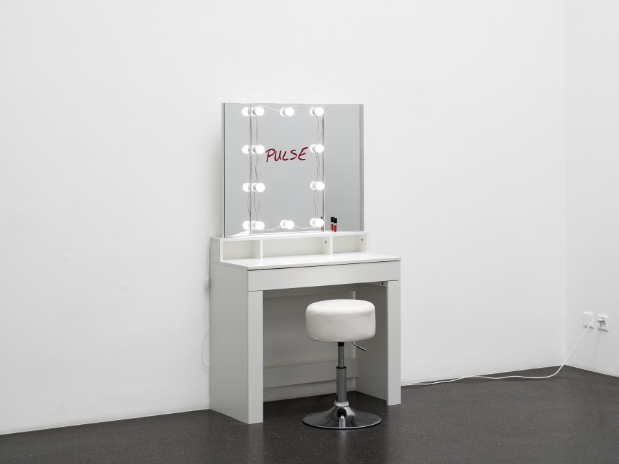 Puppies Puppies (Jade Guanaro Kuriki-Olivo), Backstage Vanity Mirror (Pulse), 2023, Cosmetic table made of melamine-coated MDF, pull-out drawer with three storage compartments, 3-piece folding mirror with LED-lighting, lipstick on mirror, Dior Forever Liquid 820 lipstick, stool, 157 × 90 × 42 cm