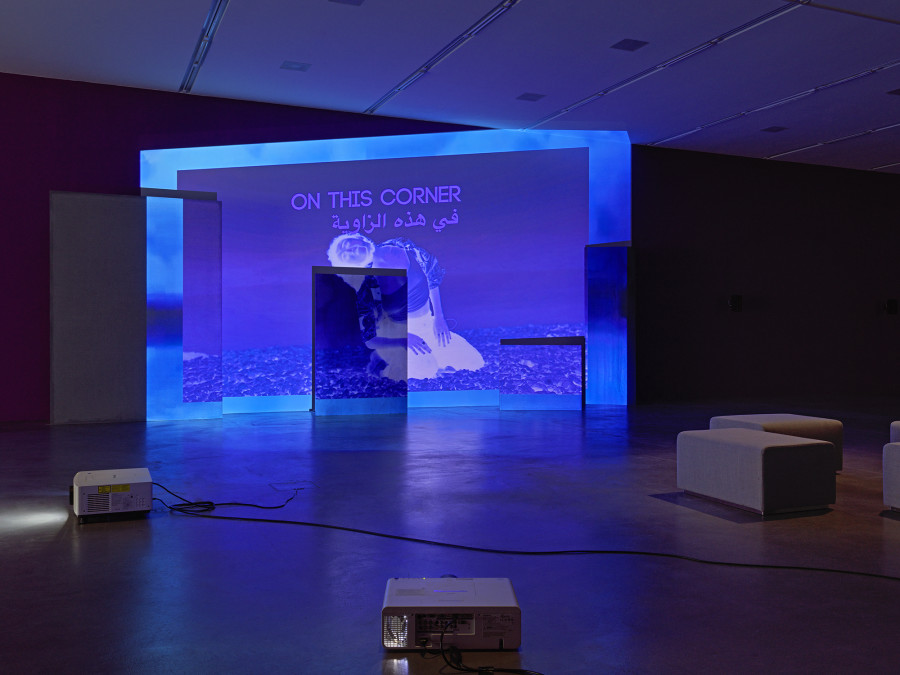 Basel Abbas & Ruanne Abou-Rhame, May amnesia never kiss us on the mouth: Only sounds that tremble through us, 2022, 4-channel video projection (HD, color, sound) on partition wall, metal and concrete panels, photographic gel. Performer: Rima Baransi, Haykal, Julmud, Makimakkuk. Courtesy the artist. Co-commissioned by the Museum of Modern Art, New York, and Dia Art Foundation, New York. Photo: Stefan Altenburger Photography, Zurich