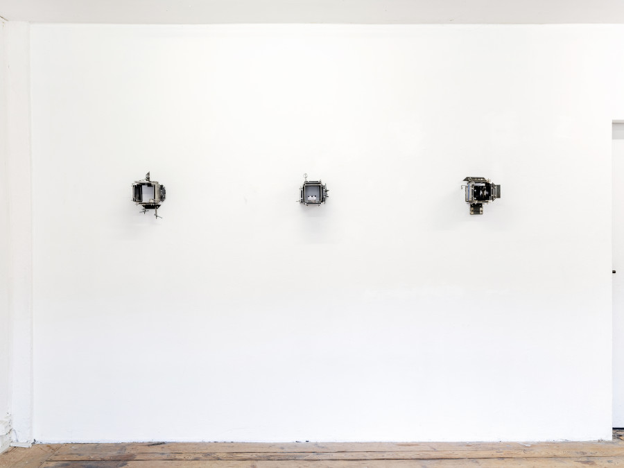 Rachel Fäth, port 1, port 2, port 3, 2022, Steel, screws, nuts, bolts, hinge, tape, price tag, ink, boiled linseed oil. Courtesy Francis Irv, New York