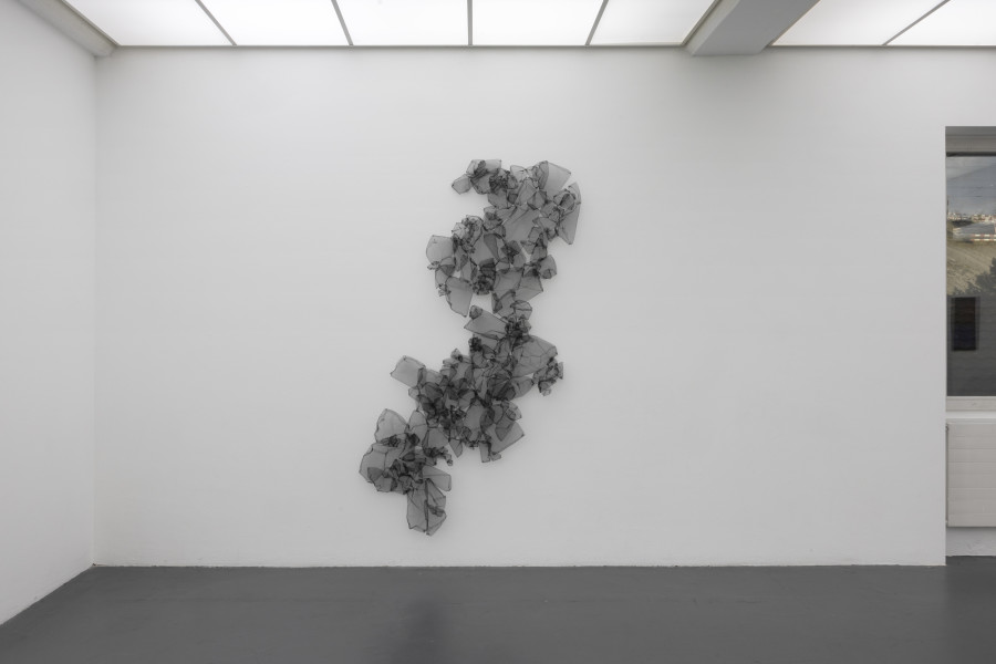 Claudia Gutiérrez Marfull, Translucent rocks, 2023, Nylonfaden und Tüll, 200×120×12cm. Installation view Kunsthaus Baselland. Photo: Gina Folly