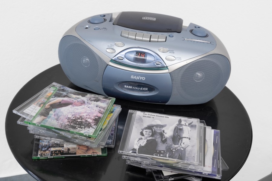 Dan Graham, Dan Graham’s Greatest Hits, Volume 1 - 21 + The Kinks, 2004–2022/2025, 22 compact discs and inkjet prints, Courtesy of The Dan Graham and Mieko Graham Foundation. Photo credits: marytwo