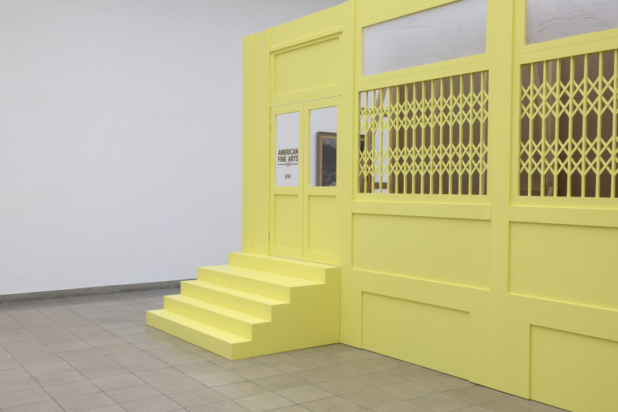 Megan Francis Sullivan, Study of a facade, American Fine Arts at 22 Wooster Street, New York, circa 2002, deatil, 2024. Wood, plexiglass, drywall, window decal, approx. 500 x 170 x 290 cm. Megan Francis Sullivan, Wolkenstudie, installation view, Kunsthaus Glarus, 2024. Photo: Gina Folly. Courtesy of the artist.