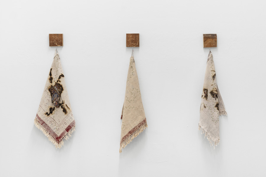 Detail of Zahrasadat Hakim,  أحن إلى خبز أمي. I yearn to my mother’s bread, 2023, 10 embroidered cloths, carved wood 50 x 45 cm each. Courtesy of the artist and La Rada, Locarno. Photography by Riccardo Giancola