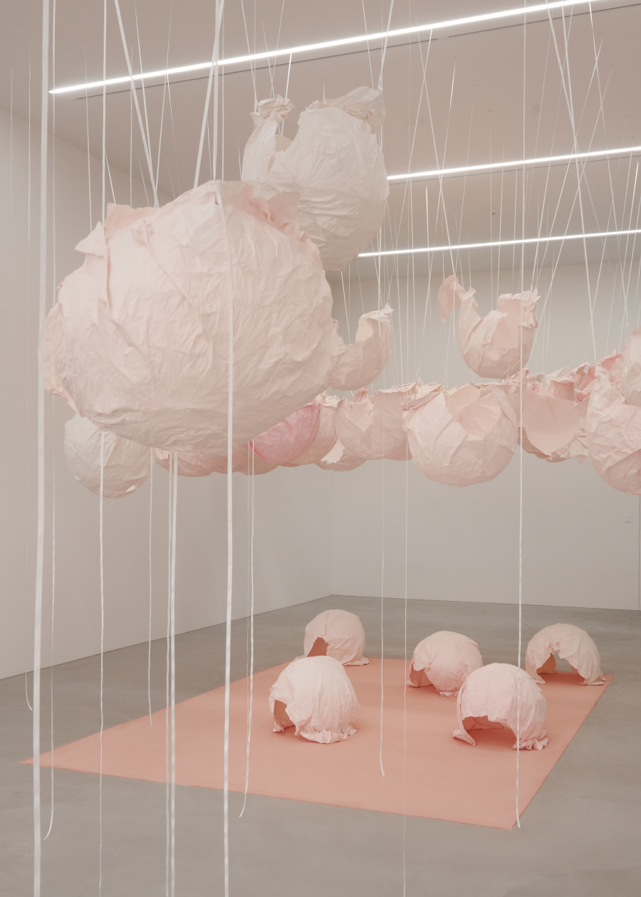 Karla Black, The Academy (earlier), 2024. Plaster powder, powder paint, cartridge paper, watercolor inks, ribbon, toilet paper, bath-bombs, nail polish, blusher pearls. Exhibition detail of site-specific sculpture. Courtesy the artist, Galerie Gisela Capitain, Cologne and Modern Art, London. Photo: Flavio Karrer