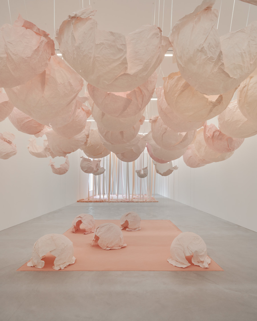 Karla Black, The Academy (earlier), 2024. Plaster powder, powder paint, cartridge paper, watercolor inks, ribbon, toilet paper, bath-bombs, nail polish, blusher pearls. Site-specific sculpture. Courtesy the artist, Galerie Gisela Capitain, Cologne and Modern Art, London. Photo: Flavio Karrer
