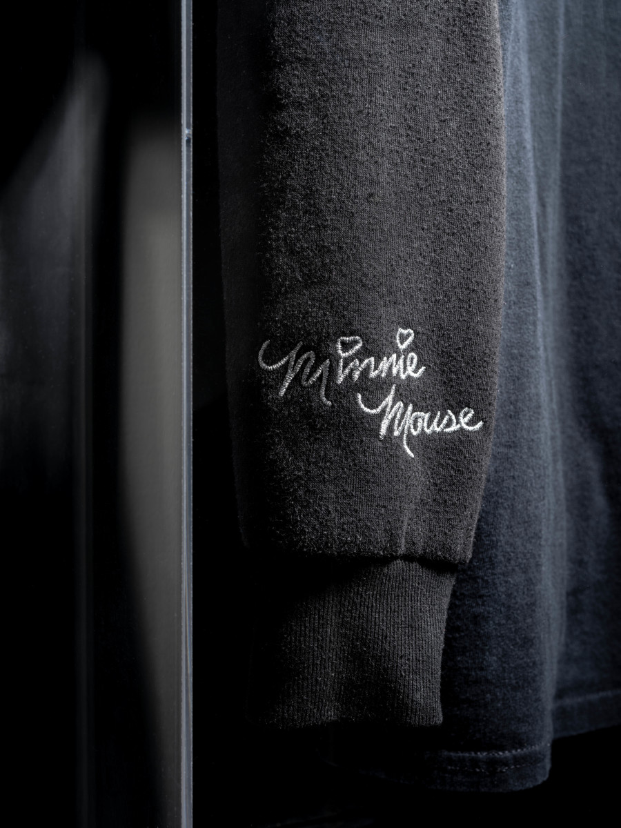 Julian-Jakob Kneer, FANATIC (7) (Detail), 2025, Archival Deathlike Silence Productions t-shirt, Minnie Mouse hoodie,
cast rubber and acrylic glas vitrine, 106 x 76 x 22 cm. Courtesy the artist and Blue Velvet, Zurich. Exhibition views by Andrea Luca Ammann.