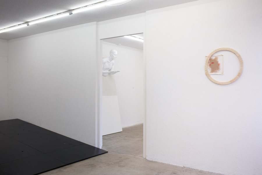 Exhibition view, Pirouettenschwindel, HAMLET. From left to right: Skjold Rambow, Trapdoor, 2024, Performance and Installation ; Karolin Braegger, Bringt nix, 2024, Acrylic on mannequin and board, Dimensions variable ; Karolin Braegger, Advice to the young girls, 2024, Lipstick and acrylic on canvas, 27x25cm ; Karolin Braegger, I‘ve come full circle, 2024, cotton, stiffened, 50x2cm. Photo credit: Leevi Toija