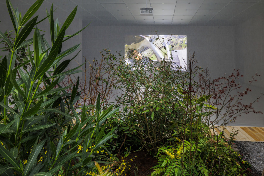 Precious Okoyomon, ONE EITHER LOVES ONESELF OR KNOWS ONESELF, Exhibition view third floor Kunsthaus Bregenz, 2025. the world requires something of me and I’m looking for a place to lie down, 2025. Photo: Markus Tretter. © Precious Okoyomon, Kunsthaus Bregenz. Courtesy of the artist