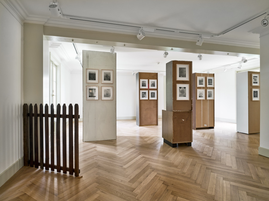 Installation view (from left to right), Vaclav Pozarek, Paradies Tür, 1998, wood, 103.5 x 110.4 x 5 cm, Christian Marclay, Sound Holes (series), 2007, rotogravure, 33.7 x 28 cm. Photo: Serge Fruehauf. Courtesy: Collection FCAC