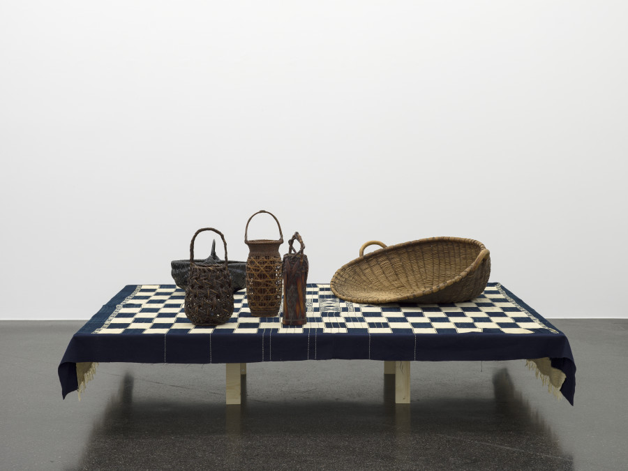 Anonymous, Bamana or Fulani blanket from Mali, hand-spun cotton in indigo blue with variations, 1950s; Mai-Thu Perret, Abnormally avid II, Glazed ceramics, steel, 2019; Anonymous, Hanakago (Flower Baskets), Showa era (1926–1989); Anonymous, Chaff Sieve, Woven willow basket, Bern, Switzerland. Photo: Cedric Mussano