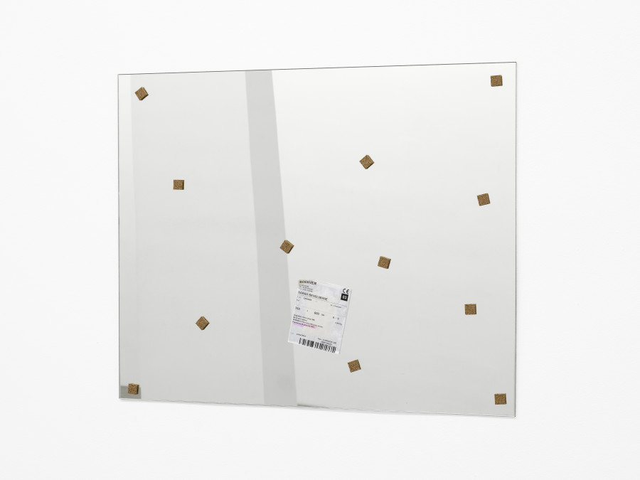 Sarah Benslimane, Untitled, 2025, Mirror, transport etiquette, cork, 60 x 76 x 1 cm. Photo: Cedric Mussano