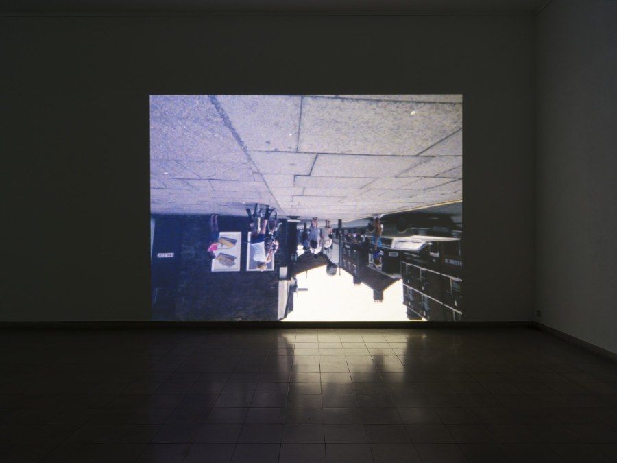 Tourism, Kunsthaus Glarus, 2021, installation view. Tony Hill, Downside Up, 1984 Single-channel video projection (16mm film transferred to SD video, color, sound), 17:32 min, Courtesy the artist and LUX, London. Photo: CE