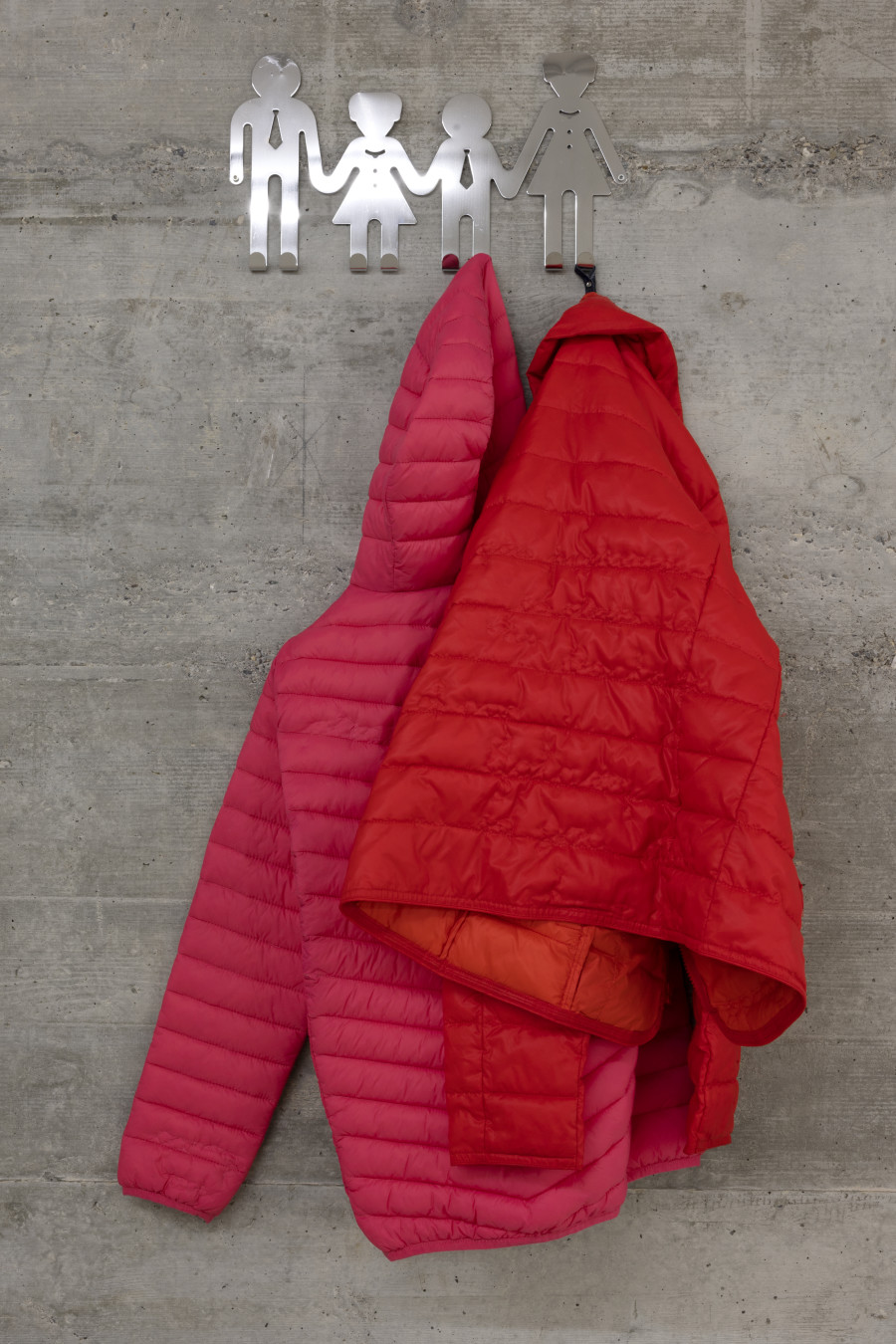Teo Petruzzi, HappY Family, 2023, puffer jackets, embroidery, door wardrobe, 120 × 53 × 24 cm. Photography: Gina Folly / all images copyright and courtesy of the artist and For, Basel