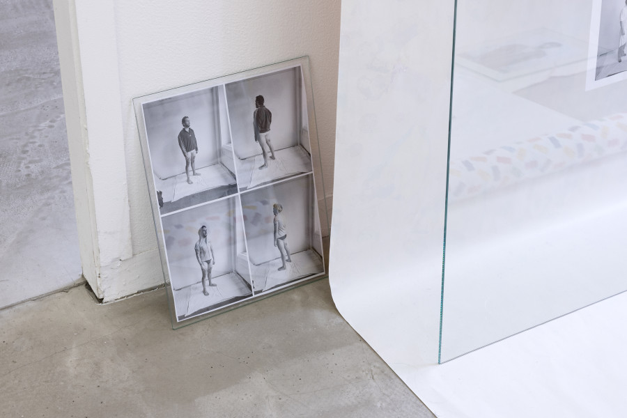 Exhibition view, Sven Gex, celebratory, Halmet, Zürich, 2025. Sven Gex, celebratory, 2025, gift wrapping paper, nails, glass, printed images from the ‚character fitting‘ series 2021-ongoing