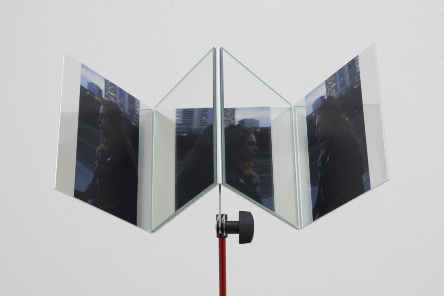 Emanuel Rossetti, Leonie, detail, 2024. Two digital c-prints on Fuji Crystal Archive paper, mounted on aluminum, mirrors, music-stand, 140 x 30 x 25 cm. Emanuel Rossetti, Stimmung, installation view, Kunsthaus Glarus, 2024. Photo: Gina Folly. Courtesy of the artist, Karma International, Zurich and Jan Kaps, Cologne.