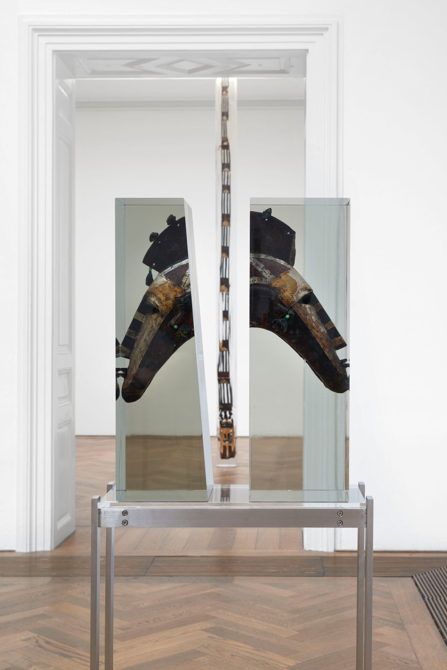 Matthew Angelo Harrison, installation view, Proto, Kunsthalle Basel, 2021, view on, Masks for Manhood, 2021 (front), and, Celestial Tower, 2021 (back). Photo: Philipp Hänger / Kunsthalle Basel