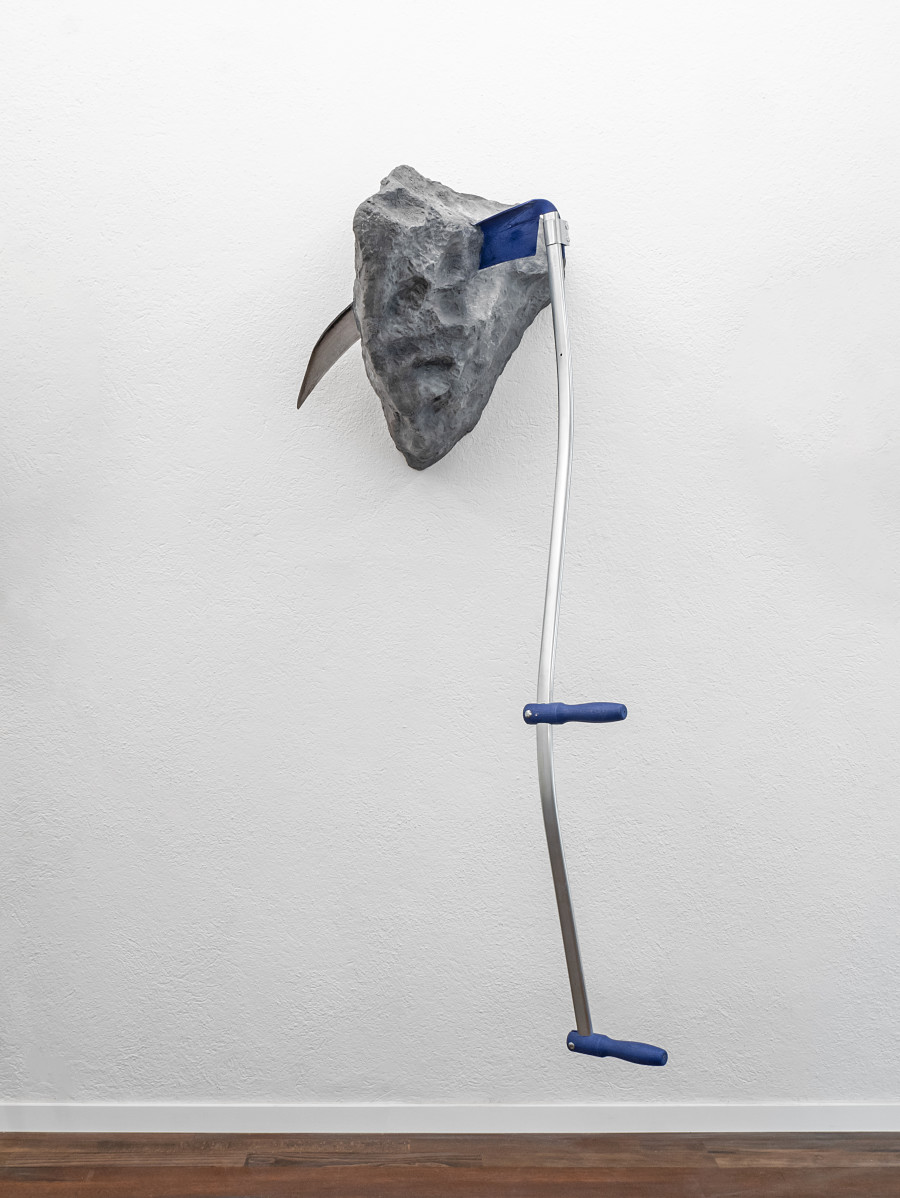 Adam Cruces, Scythe in the Stone (Blue), 2024, Scythe, acrylic, fiberglass, 150 x 70 x 75 cm. Photo copyright: Flavio Karrer. Courtesy: Adam Cruces and Blue Velvet, Zürich