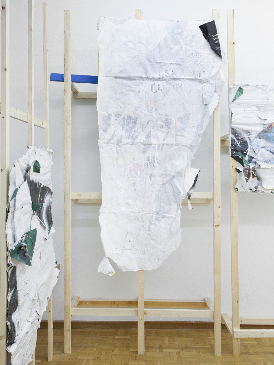 Amina Ross, Hold (4), 2022, Found paper advertisements, wheat paste, rainwater, screws, wood, acrylic latex paint, 250 x 110 x 40cm. Picture credit: Philipp Rupp/Julien Gremaud. Courtesy of the artist and Sentiment