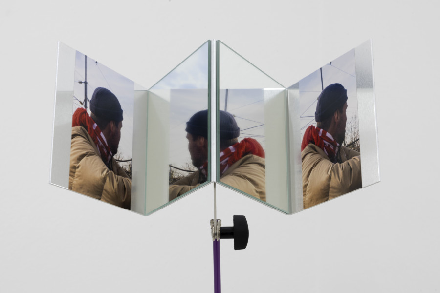 Emanuel Rossetti, Linus, detail, 2024. Two digital c-prints on Fuji Crystal Archive paper, mounted on aluminum, mirrors, music-stand, 140 x 30 x 25 cm. Emanuel Rossetti, Stimmung, installation view, Kunsthaus Glarus, 2024. Photo: Gina Folly. Courtesy of the artist, Karma International, Zurich and Jan Kaps, Cologne.