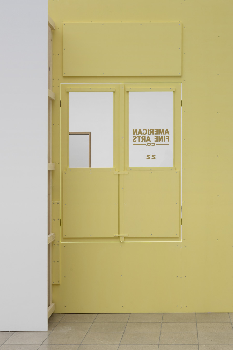 Megan Francis Sullivan, Study of a facade, American Fine Arts at 22 Wooster Street, New York, circa 2002, detail, 2024. Wood, plexiglass, drywall, window decal, approx. 500 x 170 x 290 cm. Megan Francis Sullivan, Wolkenstudie, installation view, Kunsthaus Glarus, 2024. Photo: Gina Folly. Courtesy of the artist.