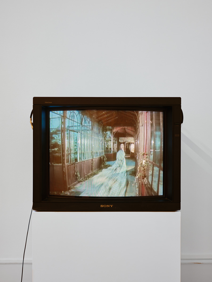 Exhibition View, ‘Stitches: A Haunted House and Other Ghost Stories’ at the Villa Bernasconi, 2026 / Photo by Nicolas Delaroche Studio. Heidi Bucher: Bellevue – Kreuzlingen, 1990, directed by Michael Koechlin, digitized 16 mm film, 9 min., color, sound, Courtesy of The Estate of Heidi Bucher, Indigo Bucher & Mayo Bucher