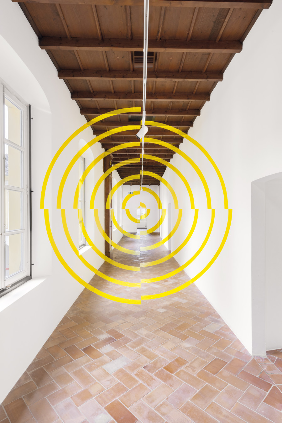 Spirale gialla, Mendrisio, 2026. Acrylic paint and vinyl film. © Felice Varini 2026, ProLitteris, Zurich. Photo: Mattia Mognetti