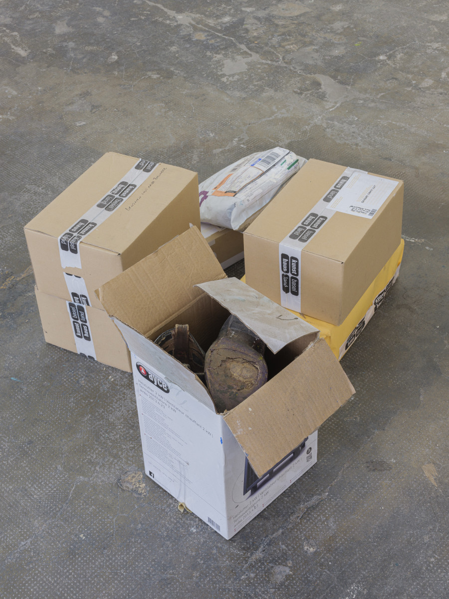 Théa Giglio, Artists shoes, 2025, cardboard boxes from the exhibition Artist’s Shoes (Smallville, 2017), temporarily displaced from attic storage, Variable dimensions. © Sebastien Verdon