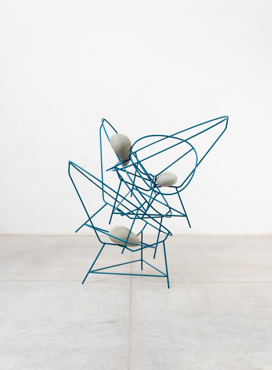 Jose Dávila, Acapulco chair stack, 2021, Metal, epoxy paint, and boulders, 148.5 x 140 x 110.5 cm. Photo: Agustín Arce